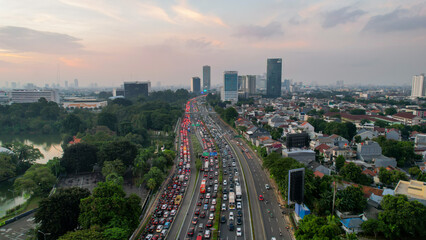 Aerial view of Jakarta highway traffic along Jendral Sudirman road in the afternoon on weekday....