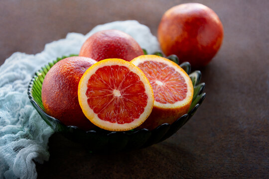 Sicilian red oranges on a dark background