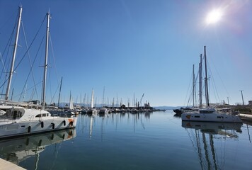 Fototapeta na wymiar preveza city new port yatches boats ships in lbue sea and sunny winter day in greece