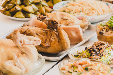 selective focus of boiled duck and any food are served with different kinds for chinese new year celebration. food for the spring festival.