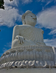 Fototapeta premium Big Buddha lovely large statue made from white marble on top of mountain in Phuket Thailand