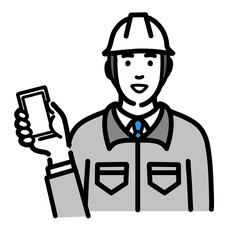 スマートフォンを持っている現場作業員の男性
