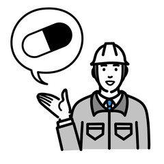 薬の説明をしているヘルメットをかぶった現場作業員の男性
