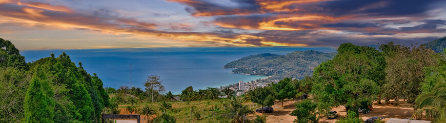 Fototapeta premium Colourful Sunset Patong Beach lovely vibrant orange, pink and Blue colours Phuket Thailand Thai 