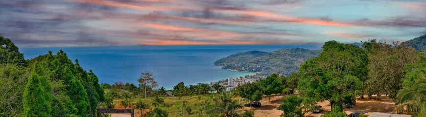 Fototapeta premium Colourful Sunset Patong Beach lovely vibrant orange, pink and Blue colours Phuket Thailand Thai 