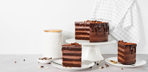 Super chocolatey cake with dark Belgian chocolate with ganache cream and chocolate glaze drips.	