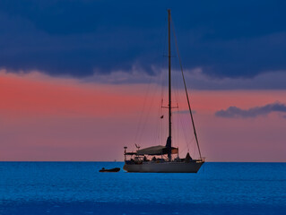Fototapeta premium Colourful Sunset Patong Beach lovely vibrant orange, pink and Blue colours Phuket Thailand Thai 