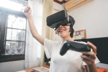 Fototapeta premium Young adult asian woman lifestyle with vr technology play a video game.