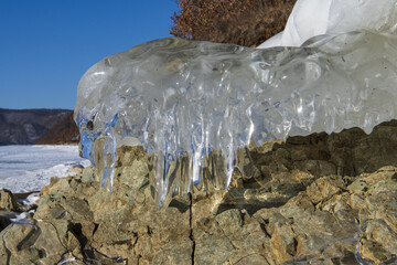 icicles hang from the stones