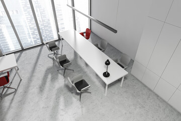 Top view of business room interior with seats, table and panoramic window