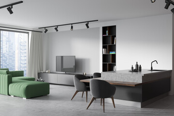 Light kitchen interior with sofa and window, dining room and relaxing space