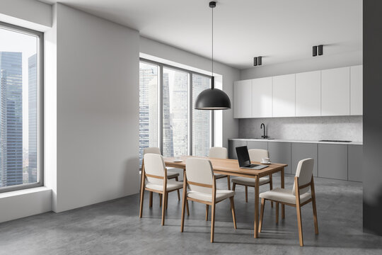 Modern dining interior with table and seats, shelves and panoramic window