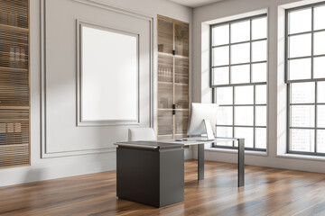 Corner view on bright office interior with desk with desktop