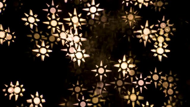 Abstract blurry, low depth of field bokeh light shapes. Vivid, colourful light effects, 4K background video clip with different shapes and dots in various colours. Perfect for Christmas backgrounds