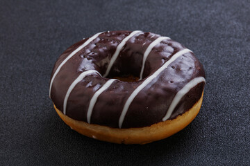 Glazed sweet tasty chocolate donut