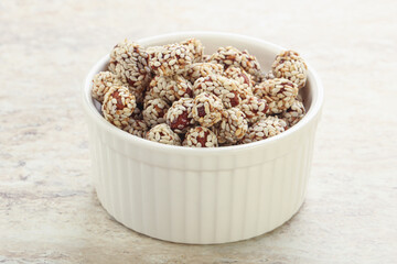 Sweet peanut in sesame seeds