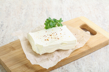 Greek Feta cheese over board
