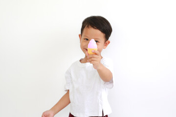 Portrait of asian little baby boy showing ice cream toy over white background.