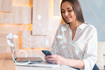 Attractive businesswoman in white shirt using smart phone to optimize development by implying new technologies in business process. Hi tech hologram over modern office background.