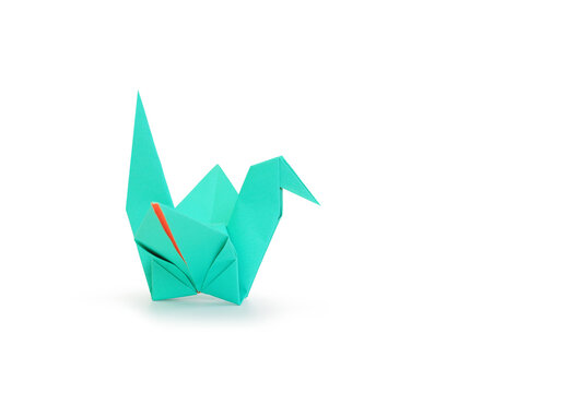 Origami bird isolated on white studio background. Image with Clipping path