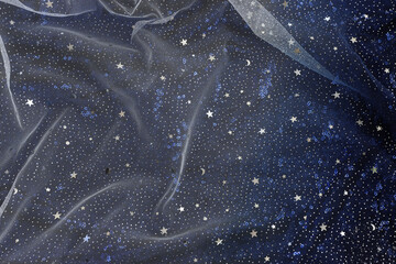 Dark blue with silver stars tulle chiffon texture background