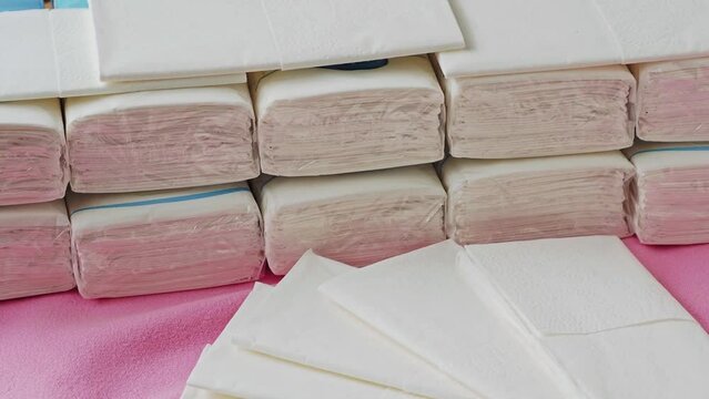 Packets of tissues. Hygienic tissues for disposable usage. Napkins easily recyclable in plastic packet .Ten tissues in the packets