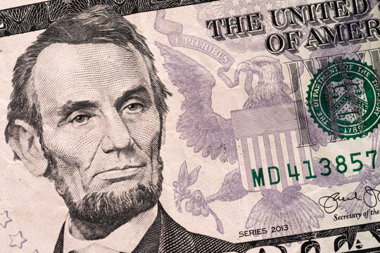 5 United States dollars paper money. Macro photo