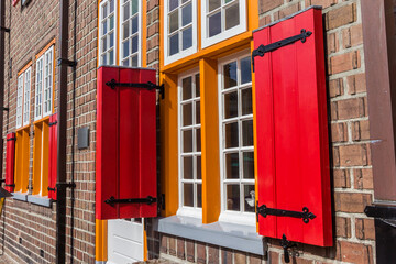 Colorful windows on a historic building in Tubbergen, Netherlands
