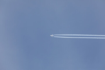Jet airliner against a pure blue sky