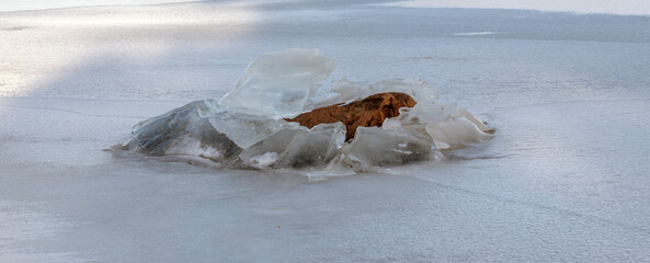 Abstract background of ice structure in a frozen lake landscape-