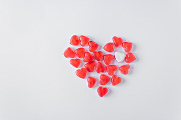 The whole heart consists of red heart-shaped jelly candies with one white jelly heart. White...