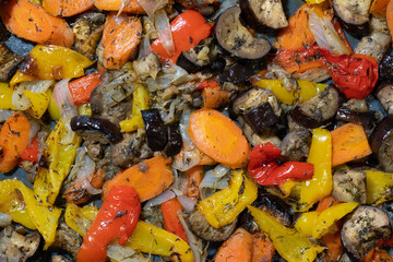 Sauteed vegetable dish with eggplant, peppers, onions, carrots and spices.