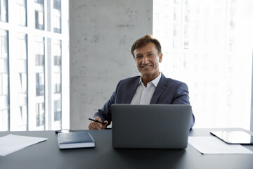 Happy mature businessman, company executive, CEO head shot portrait. Male business leader,...