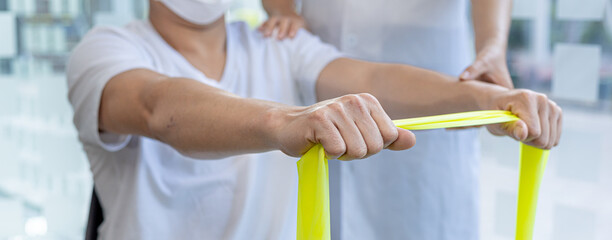 Physiotherapist is doing physical therapy for a patient, the patient has body aches due to overwork and has undergone treatment and physiotherapy with a professional physiotherapist.