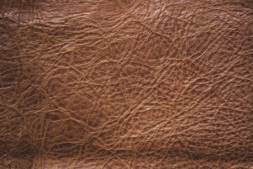 Genuine leather texture background. Dark brown, orange textures for decoration blank. Vintage skin natural suede luxury.
