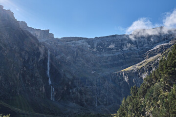 Cirque de Gavarnie waterfall with the first rays of the sun, Monte Perdido massif. France, Occitanie, Hautes Pyrenees