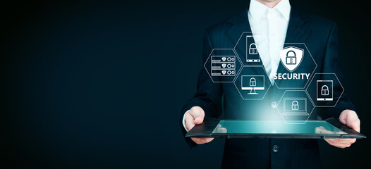 Man using security system in tablet.