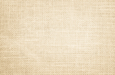 Fototapeta na wymiar Jute hessian sackcloth burlap canvas woven texture background pattern in light beige cream brown color fiber linen and cotton cloth texture as clean empty for decoration.