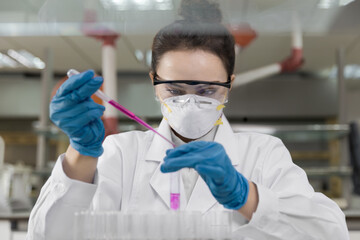 Female scientist working in laboratory