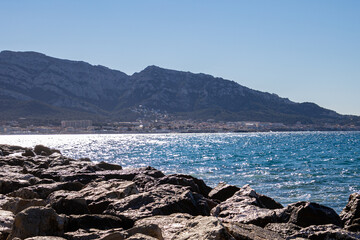 waves splashing at rocky shore of Mediterranean Sea, Prado beach, Marseille, France