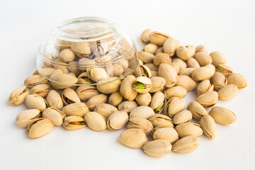 roasted pistachios on white background