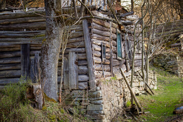 Abandoned old 19th-century log house in Slovak mountain village