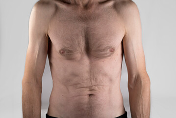 Naked Upper body of physically working older 60 years old male. No fat
