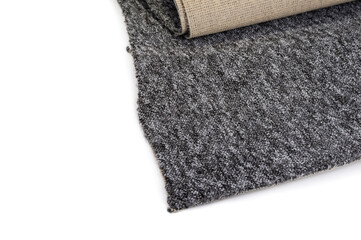 Sloppy cut carpet on a white background. Grey polyester texture.