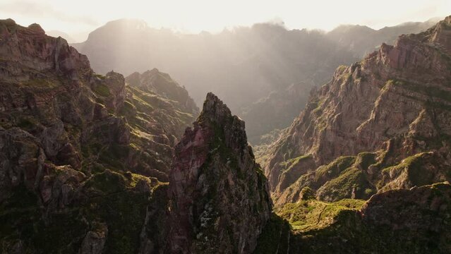 Sunset view above mountain peaks in Madeira