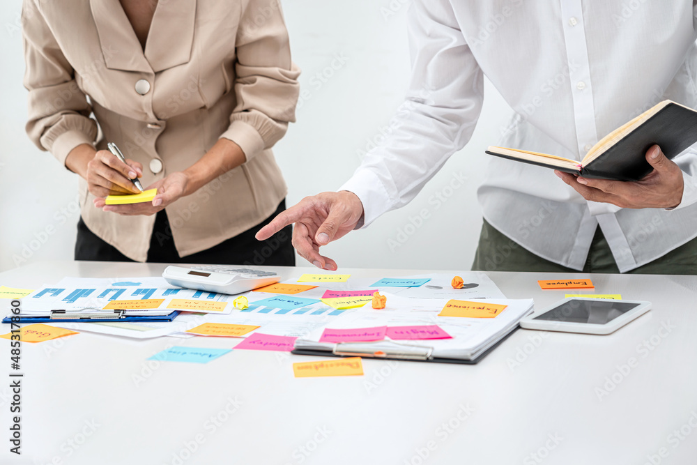 Poster business people team, boss holding book and pointing data on the table to explaining about new busin