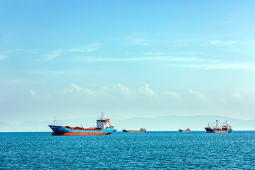 View of merchant and wey ships are waiting in the bay of sea. A bulk carrier or bulker is a...