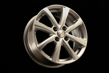 new modern alloy wheel on black background