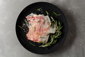 Bacon with rosemary, salt, and pepper.