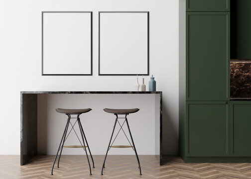 Two empty vertical picture frames on white wall in modern kitchen. Mock up interior in minimalist, contemporary style. Free space, copy space for your picture, poster. Table, chairs. 3D rendering.